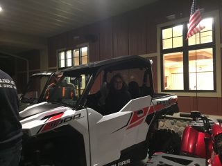 Laurie sitting in one of the demo machines we had at the public meeting